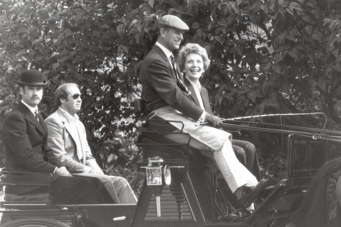 Nancy Reagan Wife Of Ronald Reagan And Prince Philip Riding In Windsor's Home Park With Escort Of Security Men 1982
