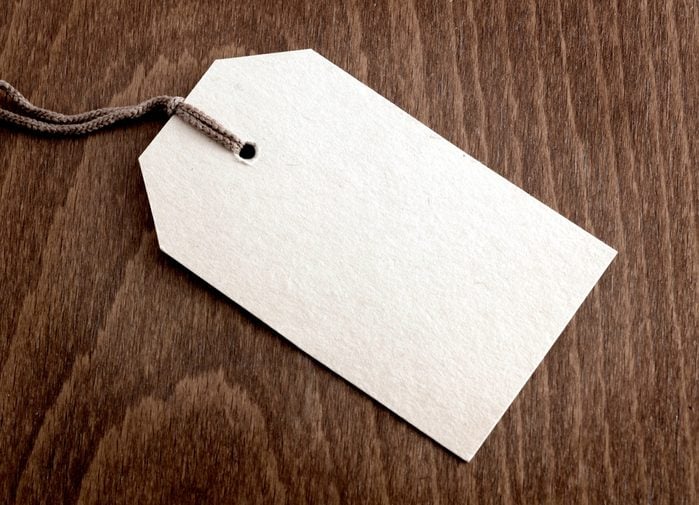 Blank tag on wooden background
