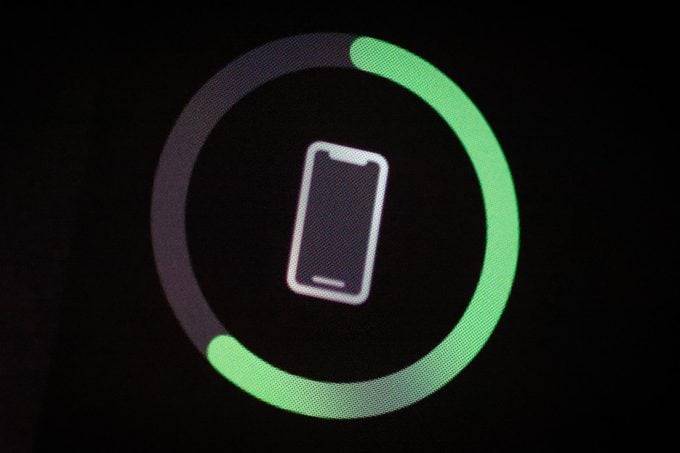 The Apple iPhone battery indicator widget is seen on an iPhone home screen 