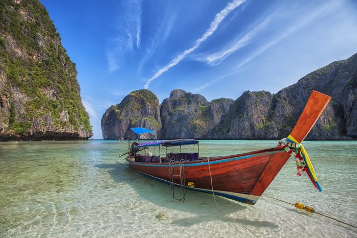 Maya beach with original long tail boat near phuket, Thailand