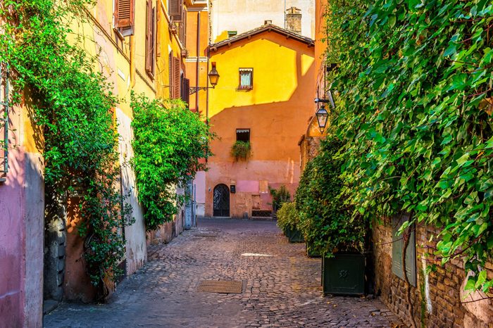 Old street in Trastevere, Rome, Italy. Trastevere is rione of Rome, on the west bank of the Tiber in Rome, Lazio, Italy. Architecture and landmark of Rome
