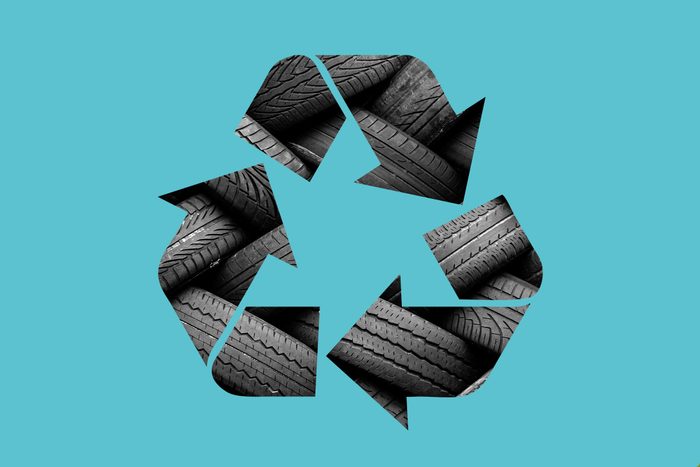 tires in a recycle symbol on a blue background