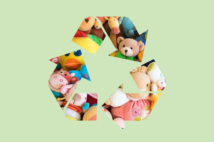 stuffed animals in a recycle symbol on a green background