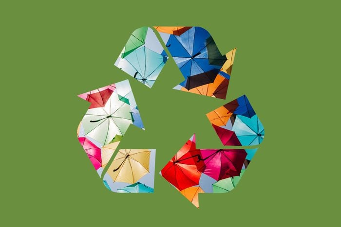 umbrellas in a recycle symbol on a green background