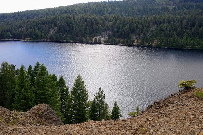 Scenic view of Payette Lake, mountains and trees from Ponderosa State Park in McCall Idaho