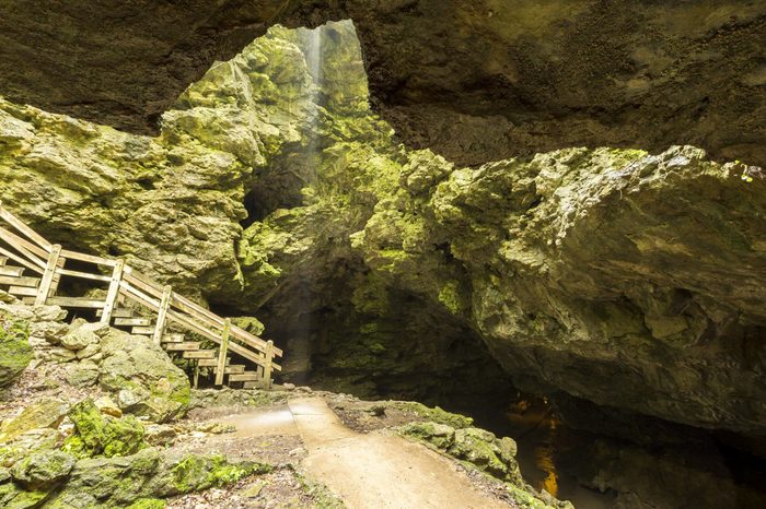 Wet Cave Entrance / A cave entrance with a small waterfall that formed during a rain storm.