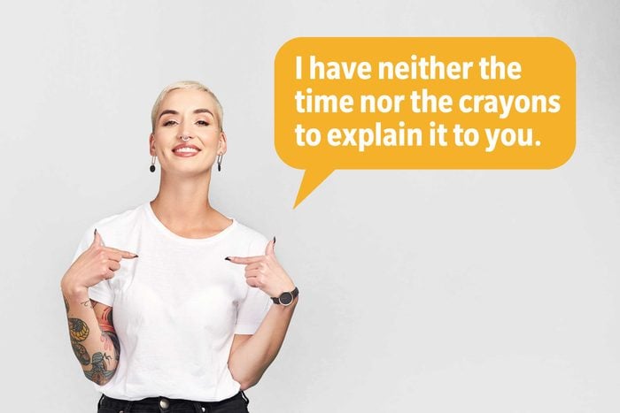 Smiling woman pointing at herself delivering a comeback roast, speech bubble text: "I have neither the time nor the crayons to explain it to you."