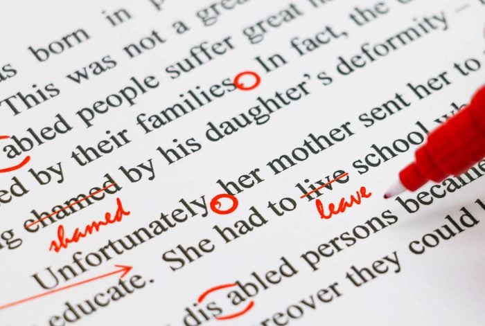 closeup red marks on proofreading english document