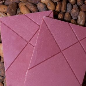 The new ruby chocolate on cocoa beans.