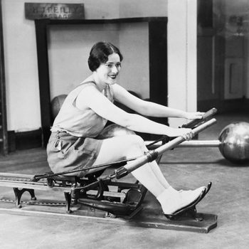 Woman using rowing machine