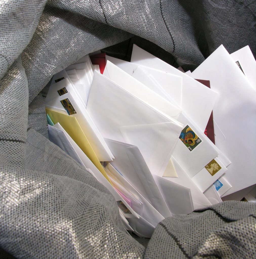 stack of mail in bag