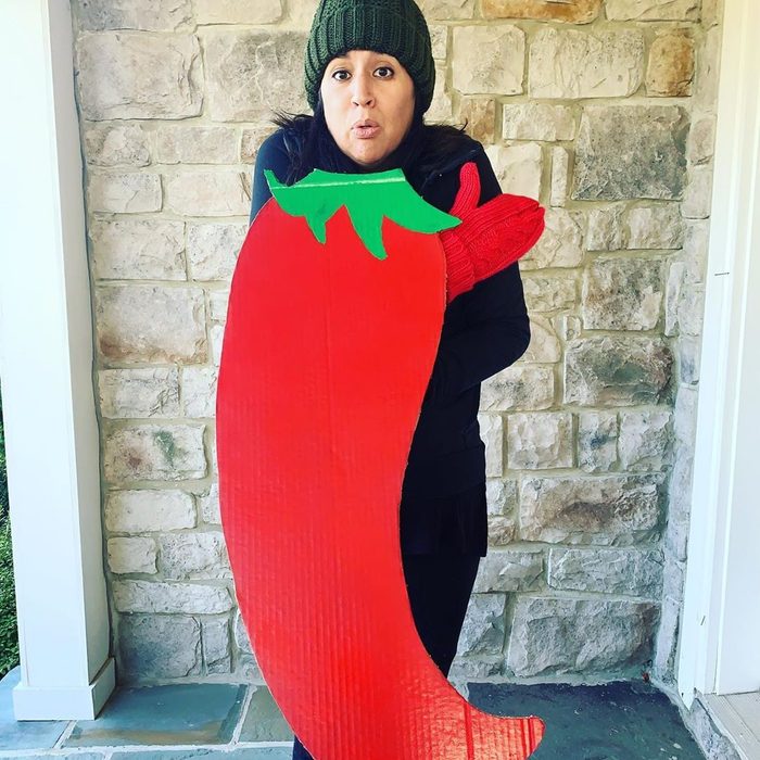 woman dressed in punny chilly pepper halloween costume