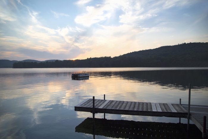 A dock and diving platform at sunset on Little Squam Lake, New Hampshire