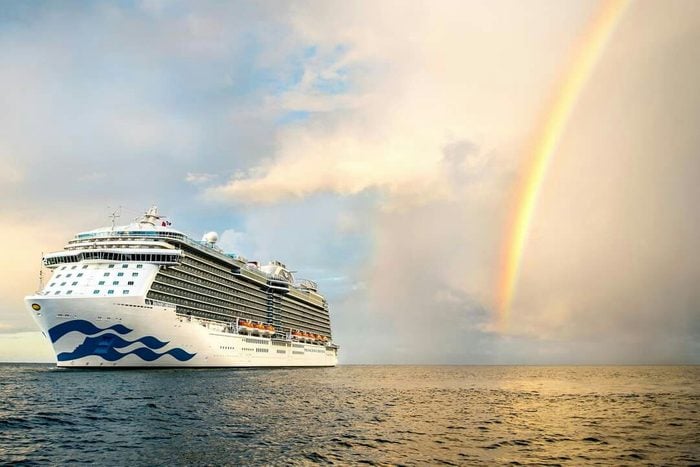 Romantic Cruise on the water with a rainbow in the background