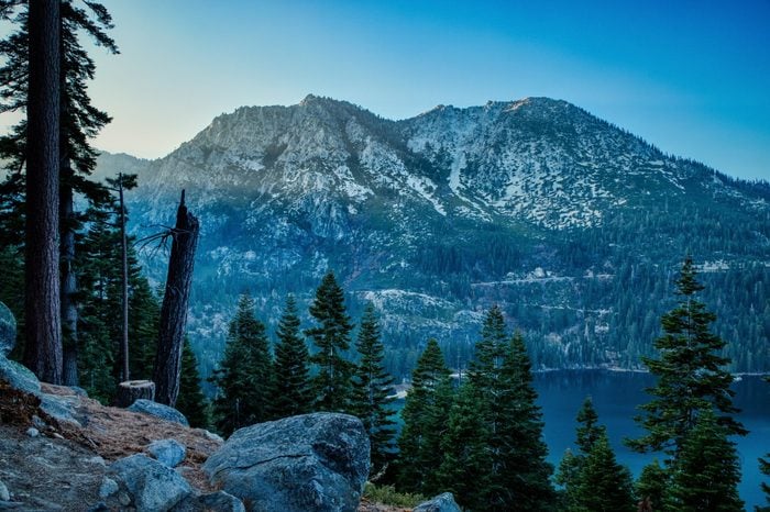 Stunning view of Jakes Peak towering above Emerald Bay at sunset from Inspiration Point scenic overlook, South Lake Tahoe, California