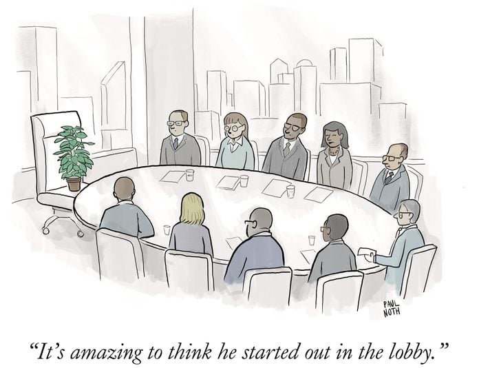 a plant sits at the head of a boardroom table and one person says, "its amazing to think he started out in the lobby."