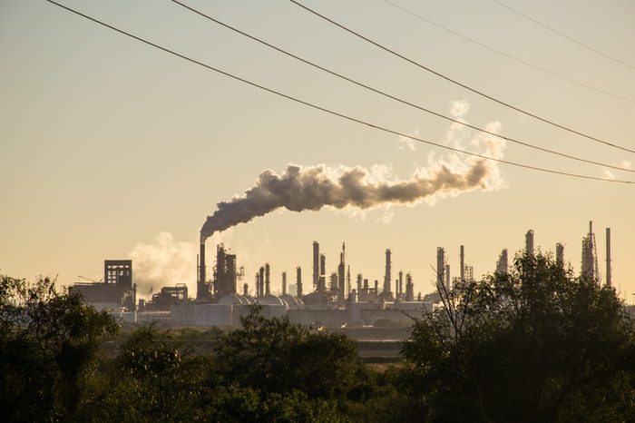 Oil refineries polluting carbon and cancer causing smoke stacks climate change and power plants in Corpus Christi , Texas a massive large refinery