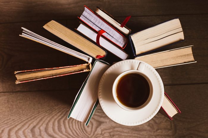 Books and tea at wooden table