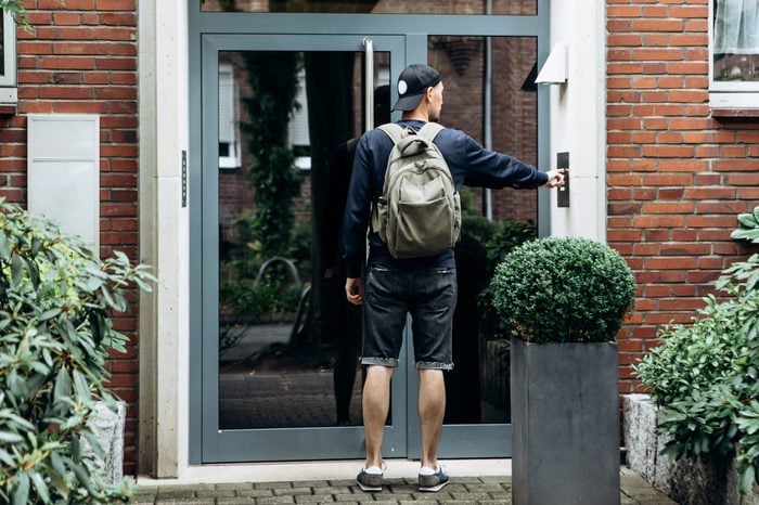 The tourist rings the doorbell to check in to the room he has booked or the student with the backpack returns home after classes at the institute or on vacation.