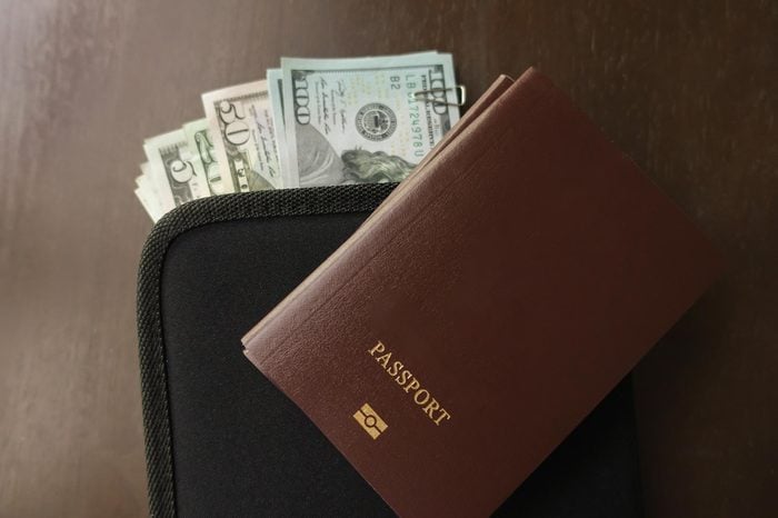 Passport and Money travel plan concept.