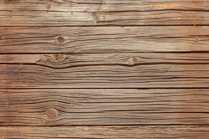 Full frame of old splintered brown wood background with copy space