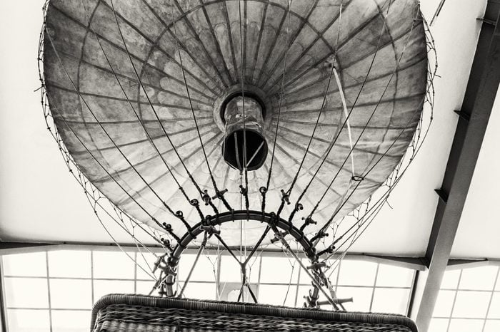 Historic hot air balloon, National technical museum in Prague, Czech republic. The transportation history exhibit. Black and white photo.