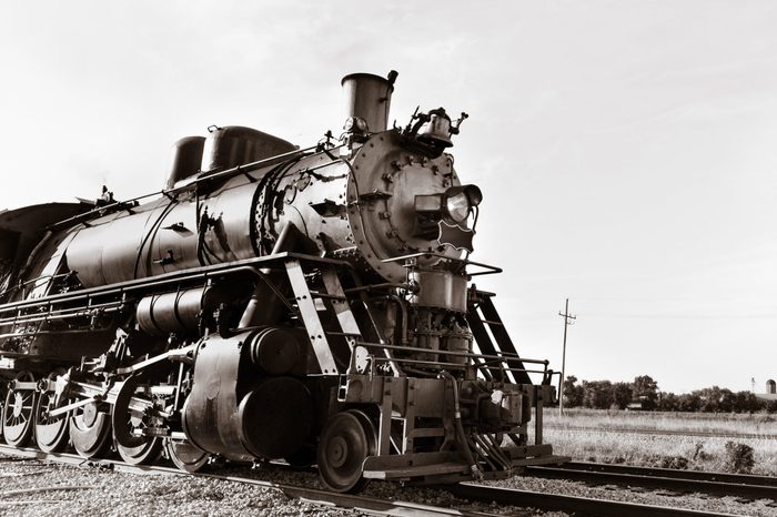 Vintage Steam powered railway engine. Copy space