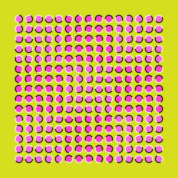The optical illusion of movement executed in the form of fluctuating pink and lilac polygons