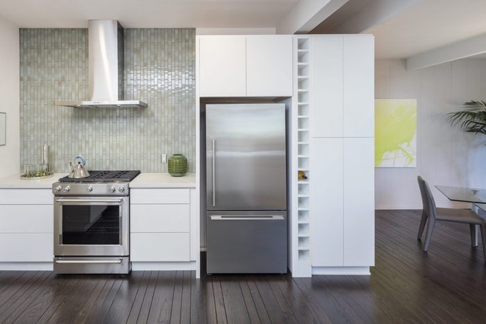 Modern kitchen interior. Design concept with new stainless steel appliances.