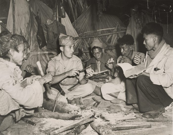 American Army Sgt. James Fletcher, with some Kachin scouts in Burma during World War 2. The Kachin natives provided information vital to the builders of the Ledo Road 1940s
