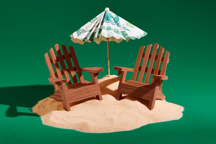 mini adirondack wooden chairs with money umbrella concept photography by sarah anne ward