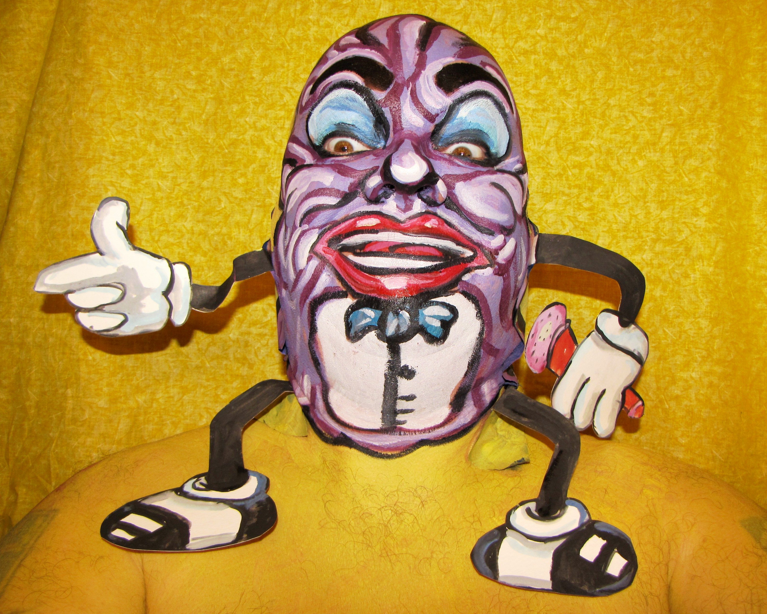 Exclusive to Rex Features Mandatory Credit: Photo by James Kuhn/Shutterstock (1033442y) California raisin James Kuhn Facepaint, Michigan, America - Nov 2009 FULL WORDS: http://www.rexfeatures.com/nanolink/52vc Wacky artist James Kuhn wowed the world by painting his own face every day for a year. Now the 47-year-old from Three Oaks, Michigan is doing it again - and his work is better than ever. Imaginative James decided to come up with a new face every day, with designs ranging from cartoon characters to some of his favourite foods. And one again he will put a smile on YOUR face with crazy caricatures of Superman, Charlie Brown, Wonder Woman and Evel Knievel. There are also poignant tributes to Michael Jackson and Mollie Sugden, the British actress famous for her role as Mrs Slocombe in sitcom Are You Being Served? He has also daubed other creations including a mummy, Freddie Kruger, a golf tee Santa and a rabid pit bull!