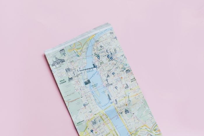 Travel planning concept : map, smartphone, sunglasses and hot coffee cup on pink background, top view with minimal style; Shutterstock ID 524232931; Job (TFH, TOH, RD, BNB, CWM, CM): RD