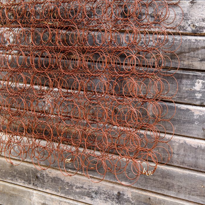 Texture of old corroded spring of mattress