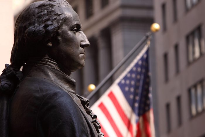 Close up on Statue of Washington on Wall Street
