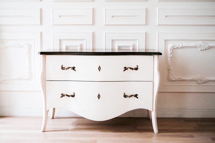 white chest of drawers in white interior