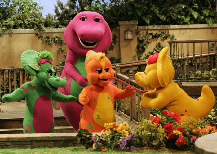 Mandatory Credit: Photo by Donna Mcwilliam/AP/Shutterstock (6376107a) Barney and Friends Riff, front, center, a new character on the Barney & Friends show, is shown with with the show's other dinosaur characters, Baby Bop, left, Barney, back, and B.J., right, during the taping of a new Barney episode at the Barney & Friends studio in Carrollton, Texas BARNEY AND FRIENDS, CARROLLTON, USA