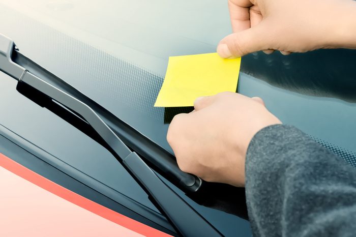 Sticky note on a windshield
