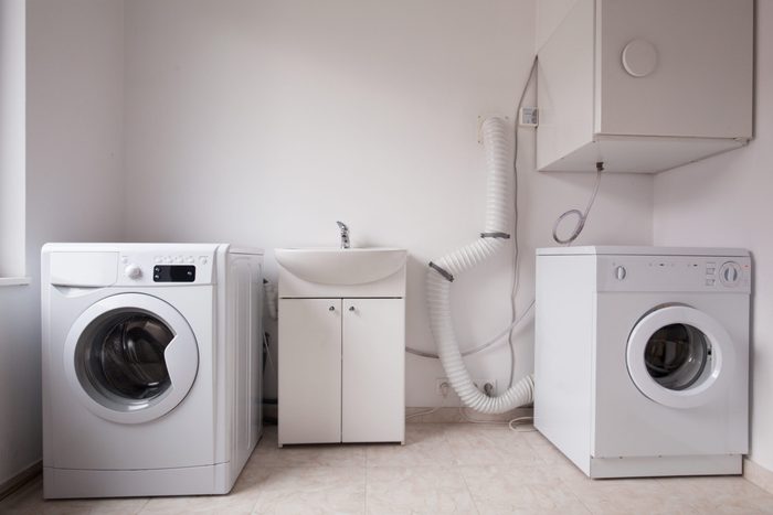 Close-up of automatic washing machines in laundry