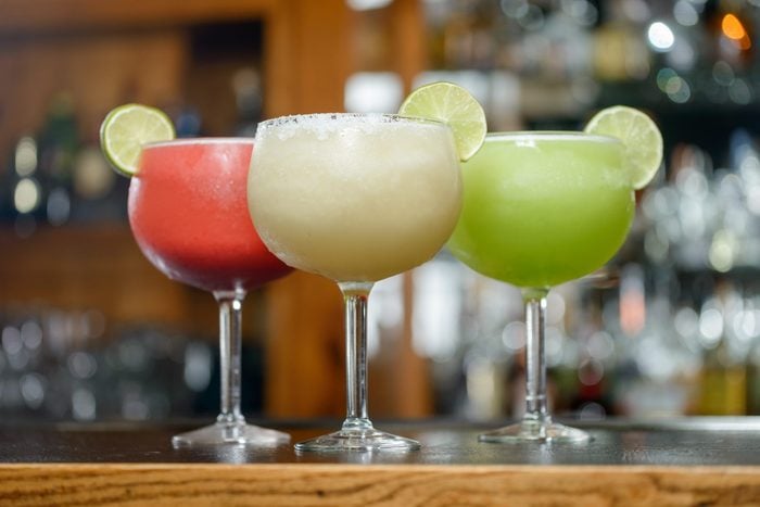 Colorful Traditional Mexican food and drink dishes margaritas and daiquiris