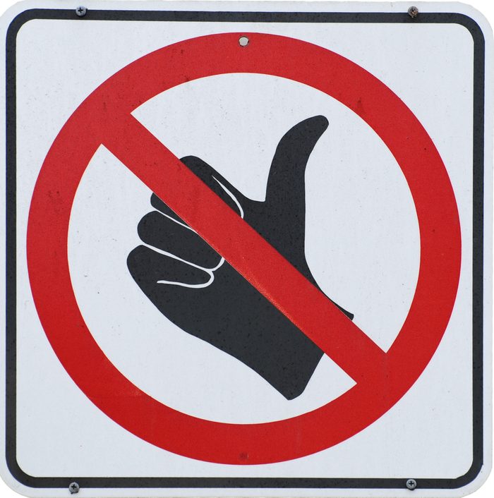 No Hitchhikers road sign