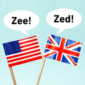 The national flag of the United Kingdom (UK) with a speech bubble that reads 