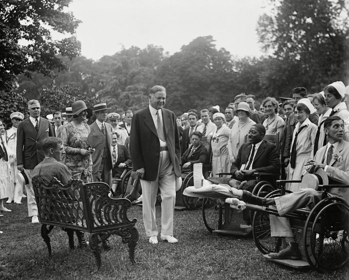 Mandatory Credit: Photo by Everett/Shutterstock (10112329a) President Herbert Hoover and the First Lady at a White House reception for Veterans, June 27, 1929. The inclusion of an African American in a photographed event was likely requested by Hoover