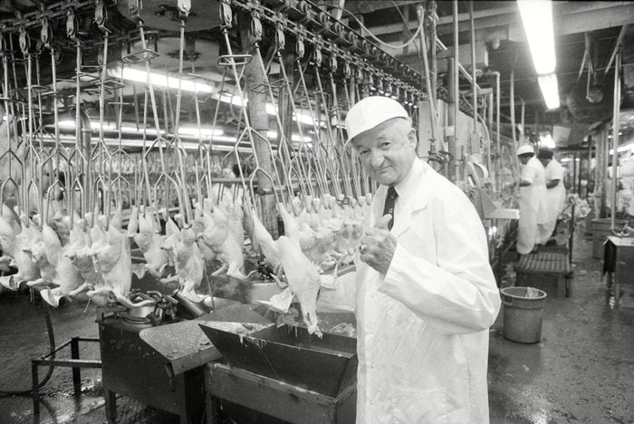 Mandatory Credit: Photo by Dan Miller/AP/Shutterstock (6571413a) Owner Frank Perdue gives a thumbs up to the freshly plucked chickens travelling the production line in his Salisbury, Md., plant, on POULTRY PLANT, SALISBURY, USA