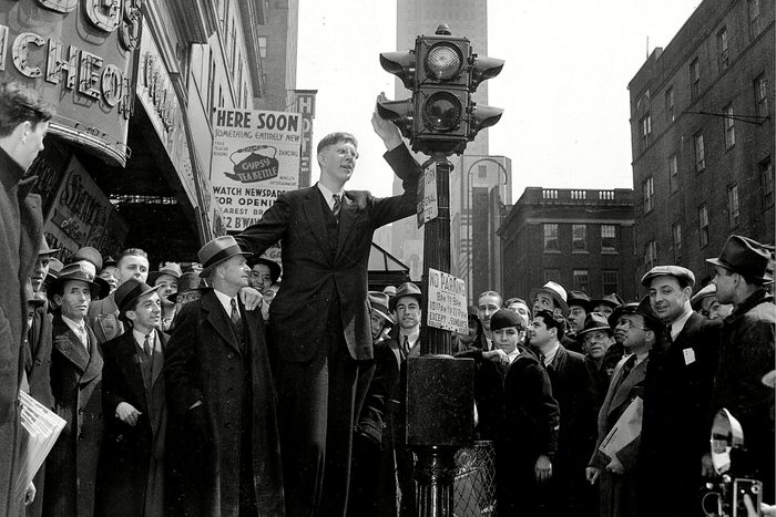 Mandatory Credit: Photo by AP/Shutterstock (6666473a) Wadlow Robert Wadlow, 18, of Alton, Ill., waits at a pedestrian traffic light as he is surrounded by a crowd in New York City, . Robert is standing with his father and manager, Harold Wadlow, left, with whom he is on a nationwide tour of schools, theaters and lecture halls. Robert, who is 8 feet and 4 inches tall, will join the Ringling Brothers Circus for a six-week appearance NYC ROBERT WADLOW, NEW YORK, USA