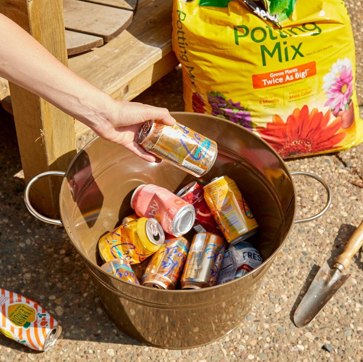 HH Handy Hints Pop cans save soil gardening