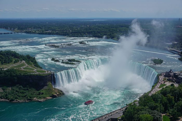 Niagara Falls, Ontario, Canada: Aerial view of tourists visiting the Niagara River, Niagara Gorge, Horseshoe Falls, and Table Rock.