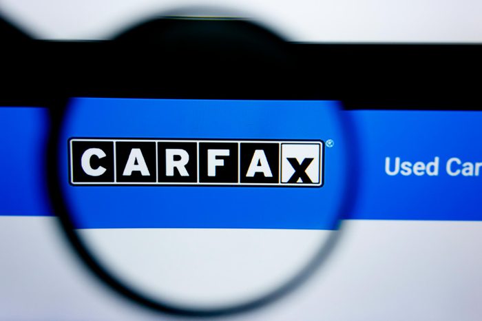 Carfax website homepage. Carfax logo visible on display screen.