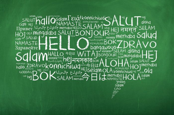 Hello Speech Bubble Word Cloud on Chalkboard in Many Different Languages