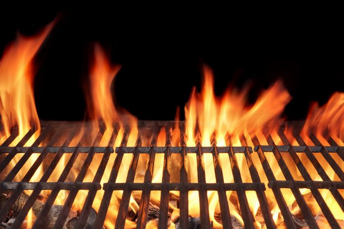 Barbecue Fire Grill close-up, isolated on Black Background